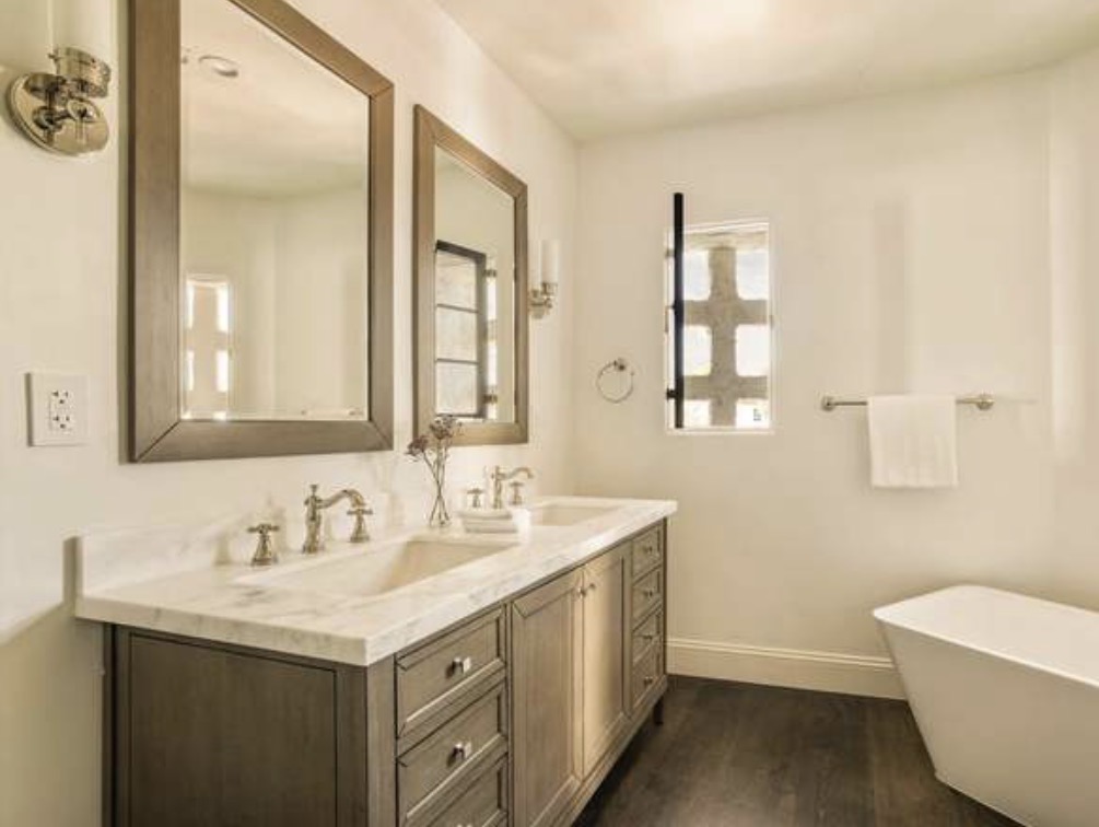 McCadden Residence bathroom with dual sinks and freestanding tub