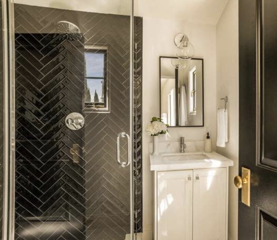 McCadden Residence bathroom with herringbone tile shower