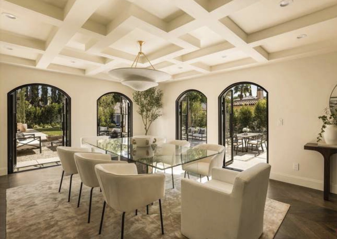 McCadden Residence dining room with coffered ceiling and arched doors
