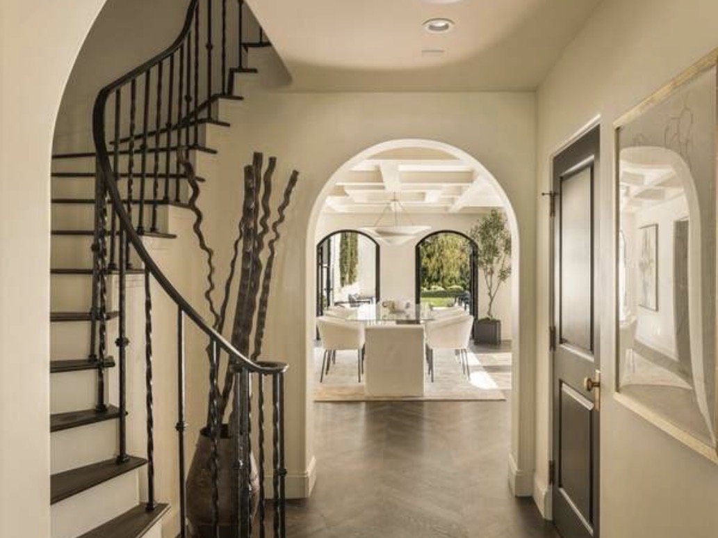 McCadden Residence curved staircase with wrought iron railing