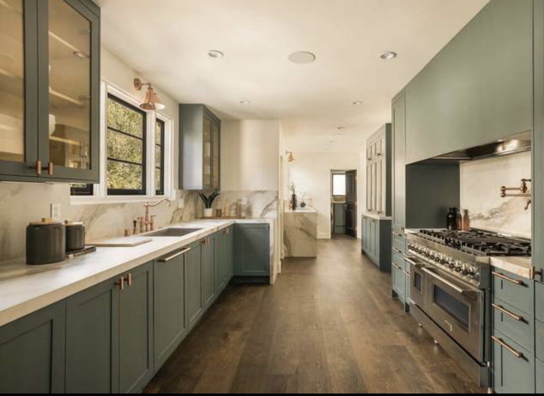 McCadden Residence kitchen with blue-gray cabinets and professional range