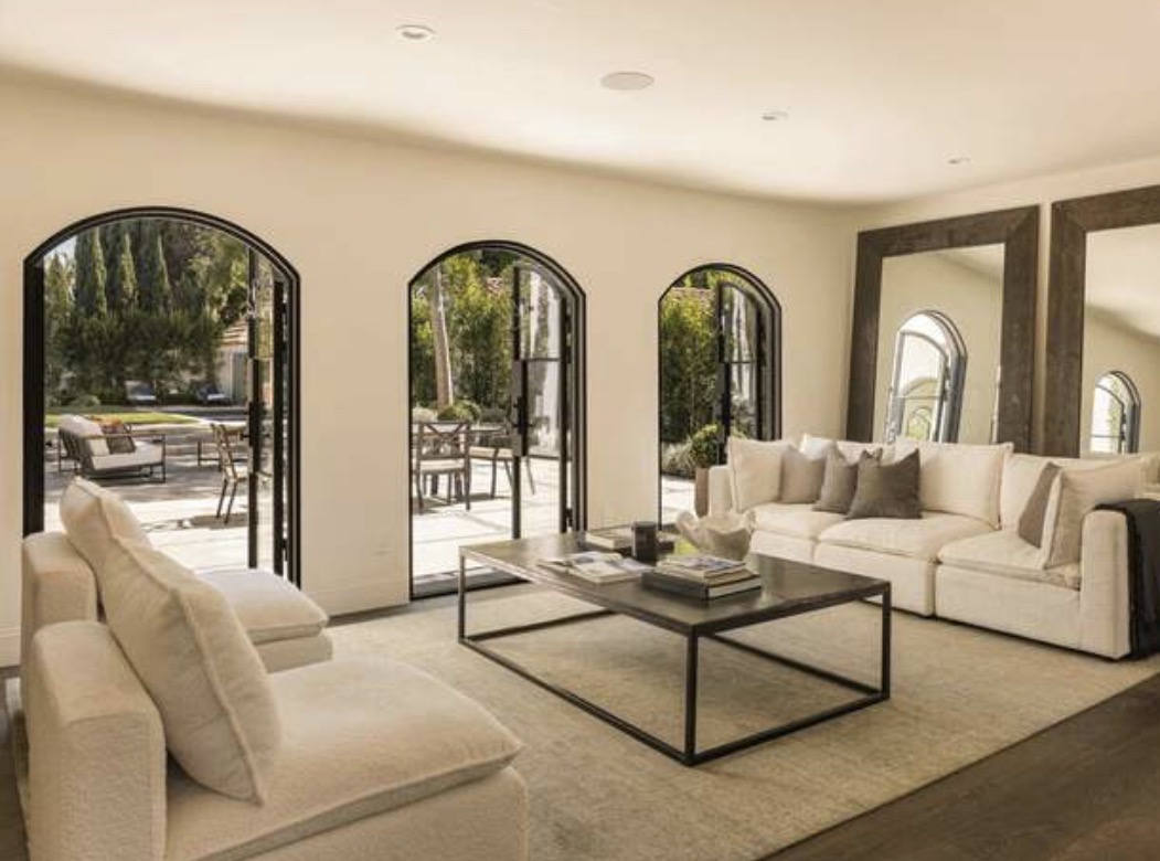 McCadden Residence living room with arched French doors