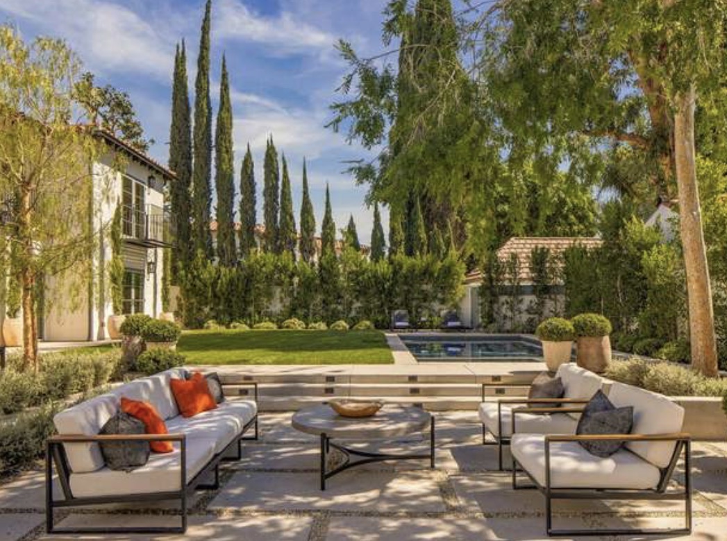 McCadden Residence pool area with Italian cypress trees